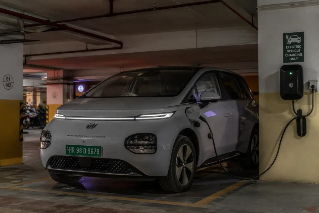 MG Windsor EV charging at home in Indian apartment parking area
