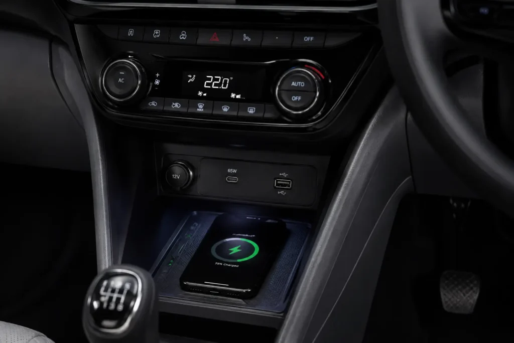 Wireless charging dock and fast-charging Type-C port inside the Tata Tiago Creative Plus